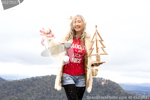 Image of Cheeky Aussie girl celebrating Christmas in July Blue Mountains 