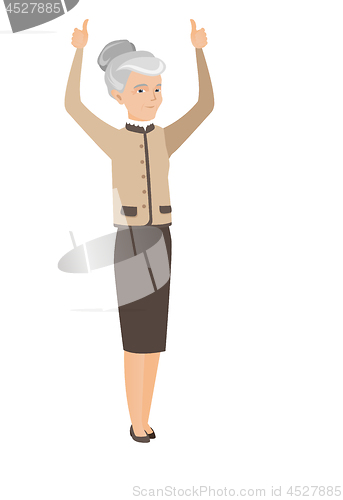 Image of Senior business woman standing with raised arms up