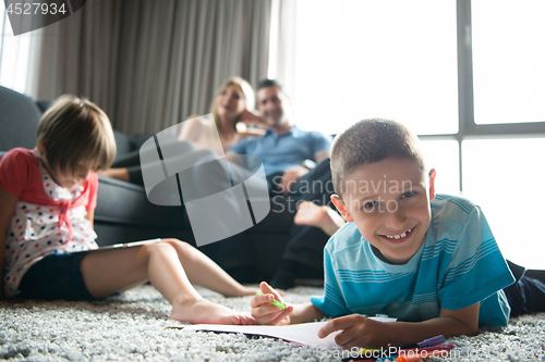 Image of young couple spending time with kids