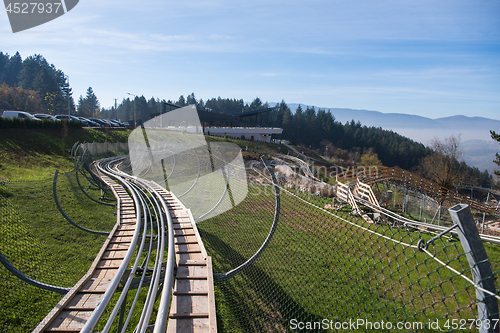 Image of couple enjoys driving on alpine coaster