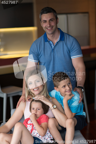 Image of couple spending time with kids