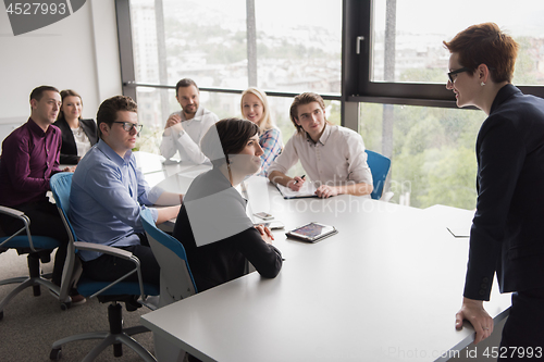 Image of Group of young people meeting in startup office