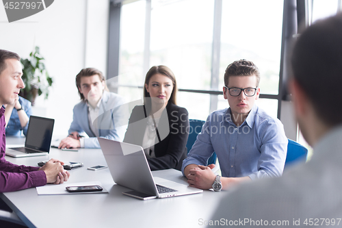 Image of Business Team At A Meeting at modern office building