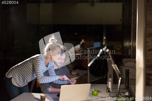 Image of young designers in the night office