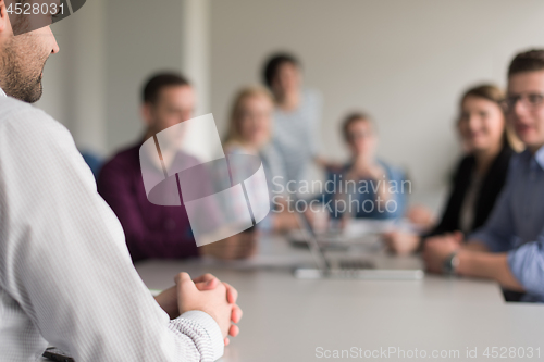 Image of Business Team At A Meeting at modern office building