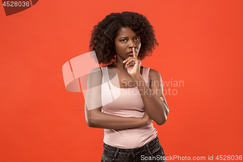 Image of Young serious thoughtful business woman. Doubt concept.