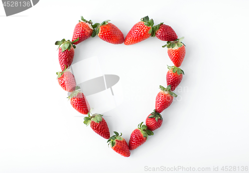Image of heart shape made of strawberries