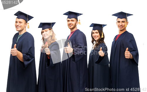 Image of graduate students showing thumbs up