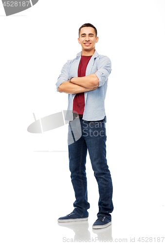 Image of smiling young man over white background