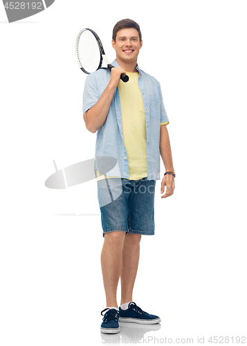 Image of smiling young man with tennis racket