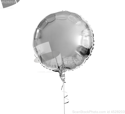 Image of one silver helium balloon over white background