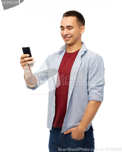 Image of happy man with smartphone over white background