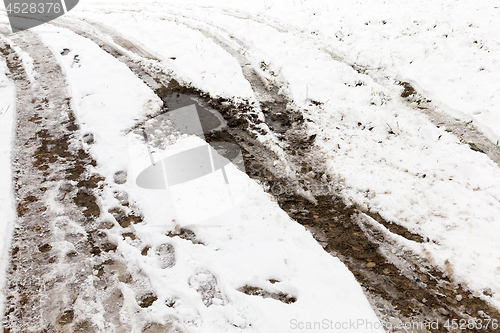 Image of traces of the car on snow