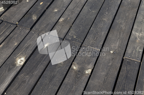 Image of black wooden surface