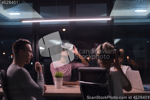 Image of Multiethnic Business team using virtual reality headset