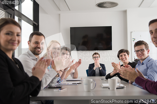 Image of Group of young people meeting in startup office