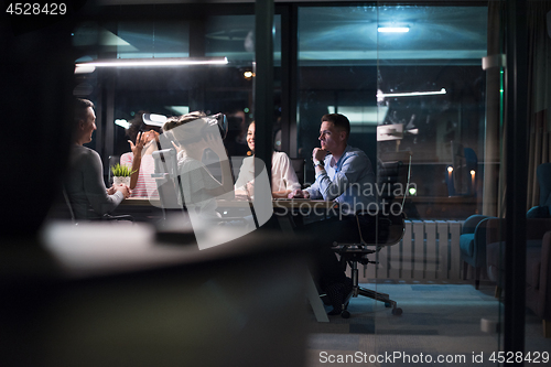 Image of Multiethnic Business team using virtual reality headset