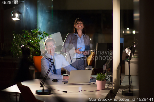Image of young designers in the night office