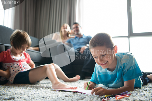 Image of young couple spending time with kids