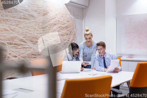 Image of Business Team At A Meeting at modern office building