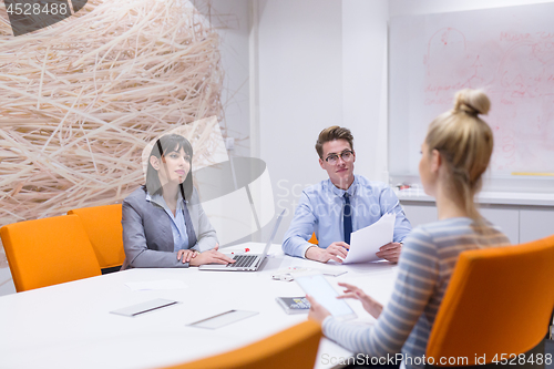 Image of Business Team At A Meeting at modern office building