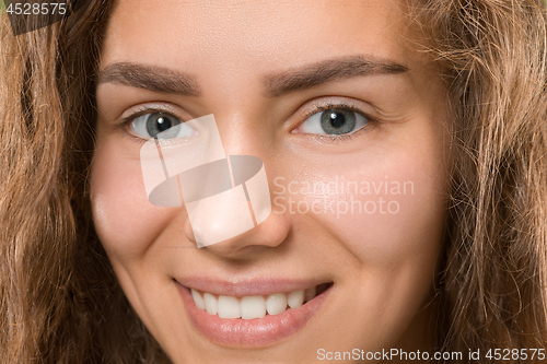 Image of The close up eye on face of young beautiful caucasian girl