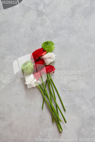 Image of colorful bouquet of flowers on a gray background