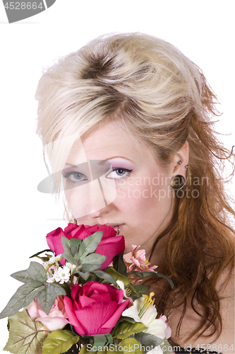 Image of Beautiful Girl Smelling Flowers