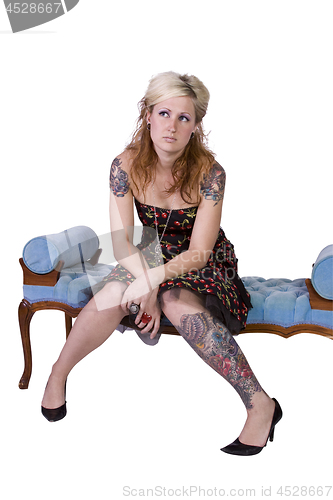 Image of Artistic Image of a Woman Sitting on a Chair