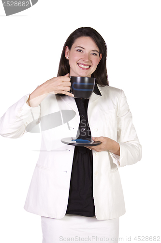 Image of Woman Drinking Coffee Standing Up