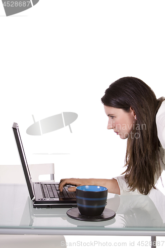 Image of Businesswoman at Her Desk Working