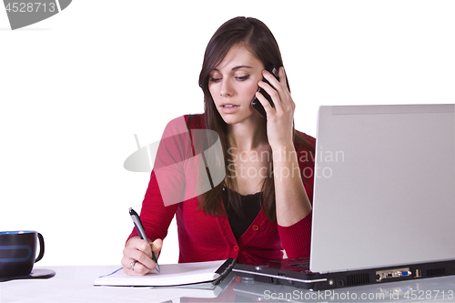 Image of Businesswoman at His Desk Working