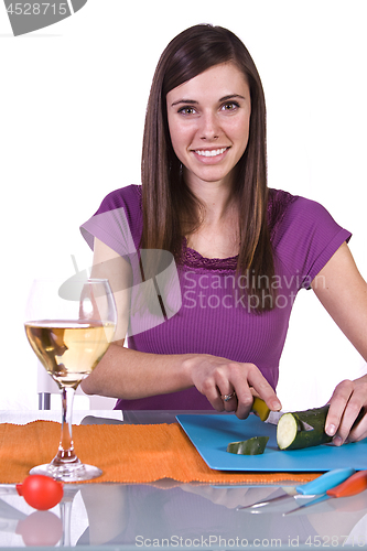 Image of Beautiful Girl Cooking in the Kitchen