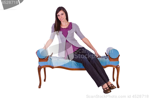 Image of Beautiful Girl Posing on the Antique Couch