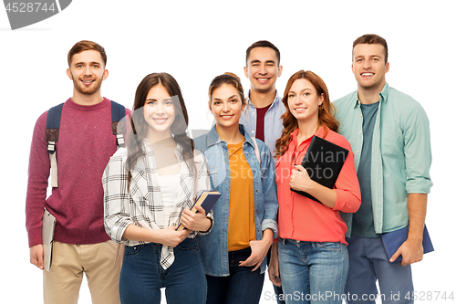 Image of group of smiling students with books