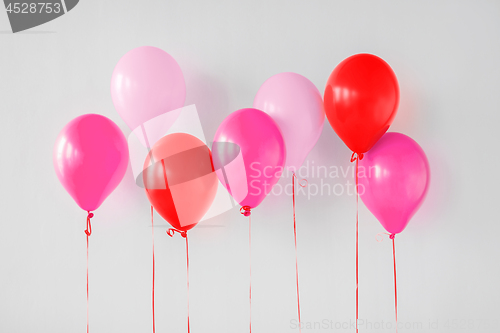 Image of pink and red air balloons for birthday party