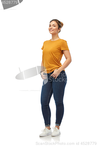 Image of young woman or teenage girl in orange t-shirt