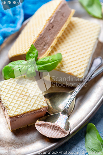 Image of Waffle sandwich with artisanal ice cream closeup.