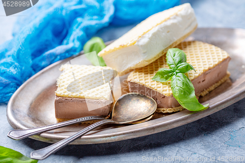 Image of Waffle sandwiches with artisanal ice cream.