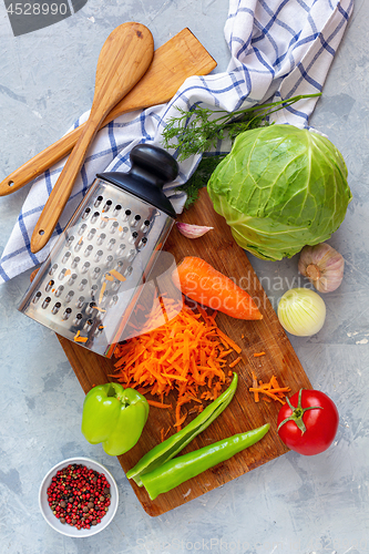 Image of Vegetables on the grey kitchen table.