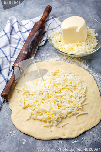 Image of Preparation of traditional pie with cheese.