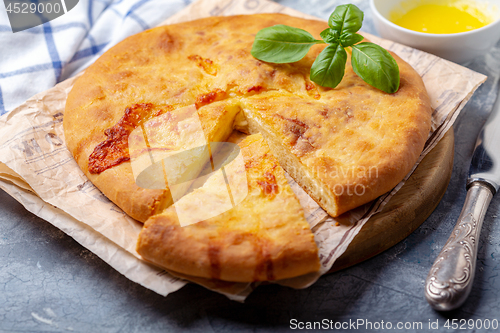 Image of Traditional Georgian closed pie with cheese.