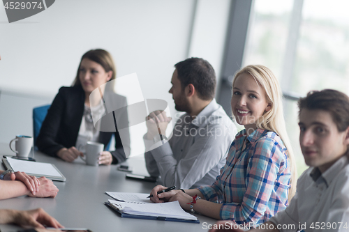 Image of Group of young people meeting in startup office