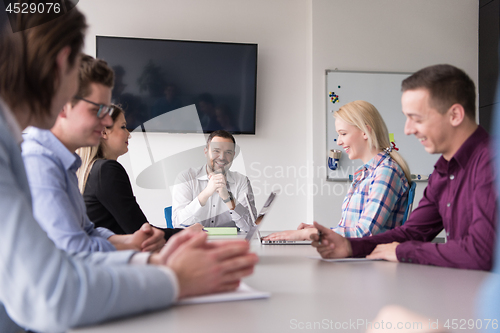 Image of Business Team At A Meeting at modern office building