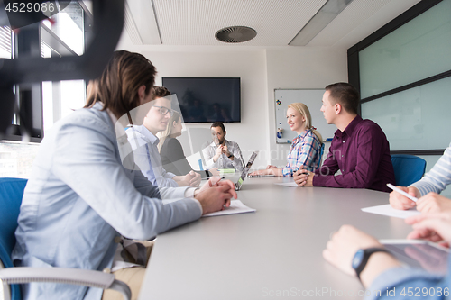 Image of Business Team At A Meeting at modern office building