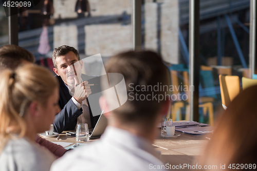 Image of Business Team At A Meeting at modern office building
