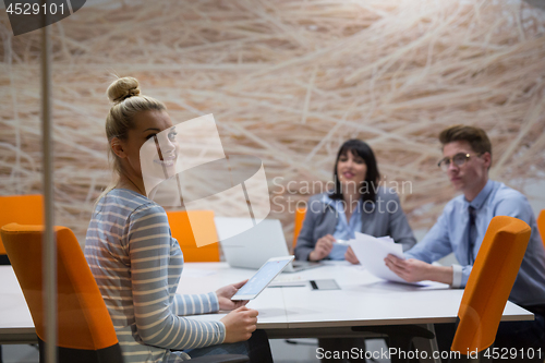 Image of Business Team At A Meeting at modern office building