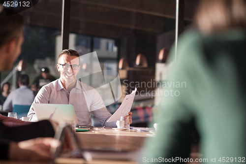 Image of Business Team At A Meeting at modern office building