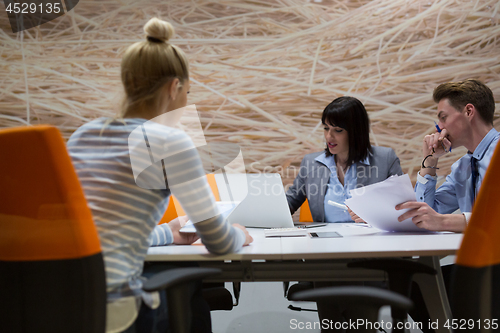 Image of Business Team At A Meeting at modern office building