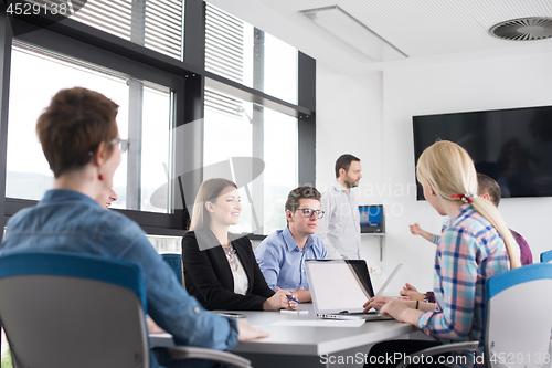 Image of Business Team At A Meeting at modern office building